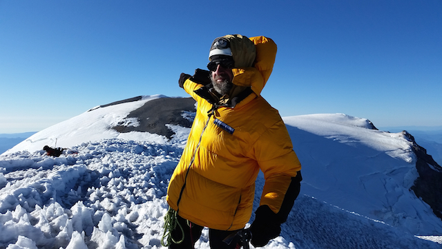 Mike Bromberg identifies 14,112' Liberty Cap on Mt. Rainier