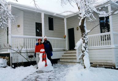 Cindi, Frosty and me in front of our house