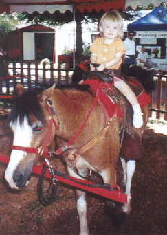 Jenna rides a horse